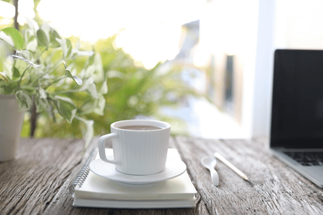 Simplify Your Life: Escape the Chaos and Focus on What Truly Matters 6 Simplify your life with a peaceful minimalist workspace featuring a clean desk, open notebook, and natural sunlight—perfect for focus, clarity, and calm living.